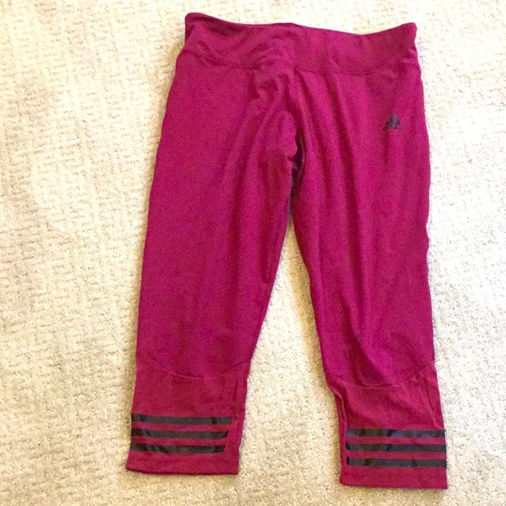 Women’s medium magenta Adidas leggings.